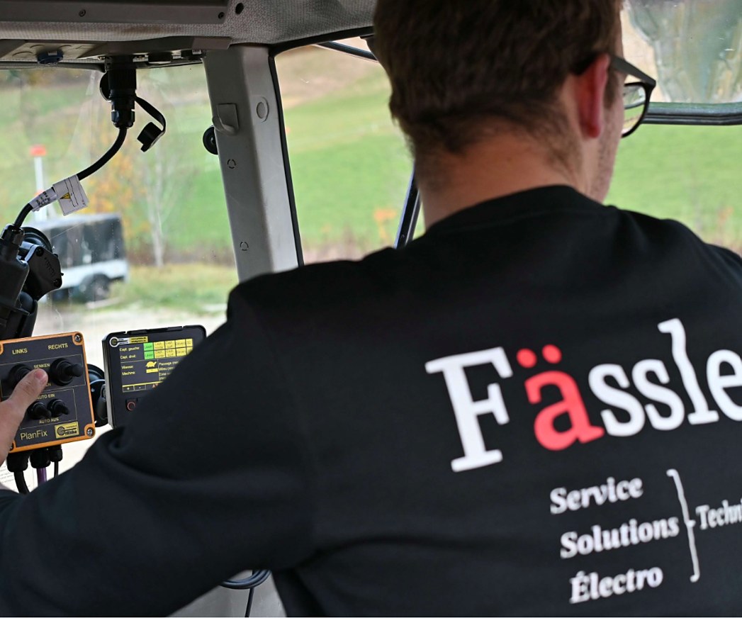 Fässler technician making the settings from the cab during commissioning